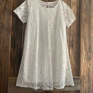 White short sleeved lined lace mini.
